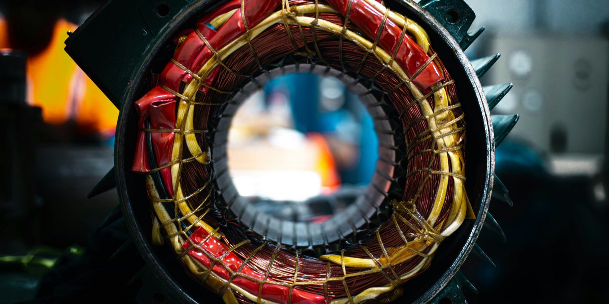 Copper stator windings inside an open electric motor frame